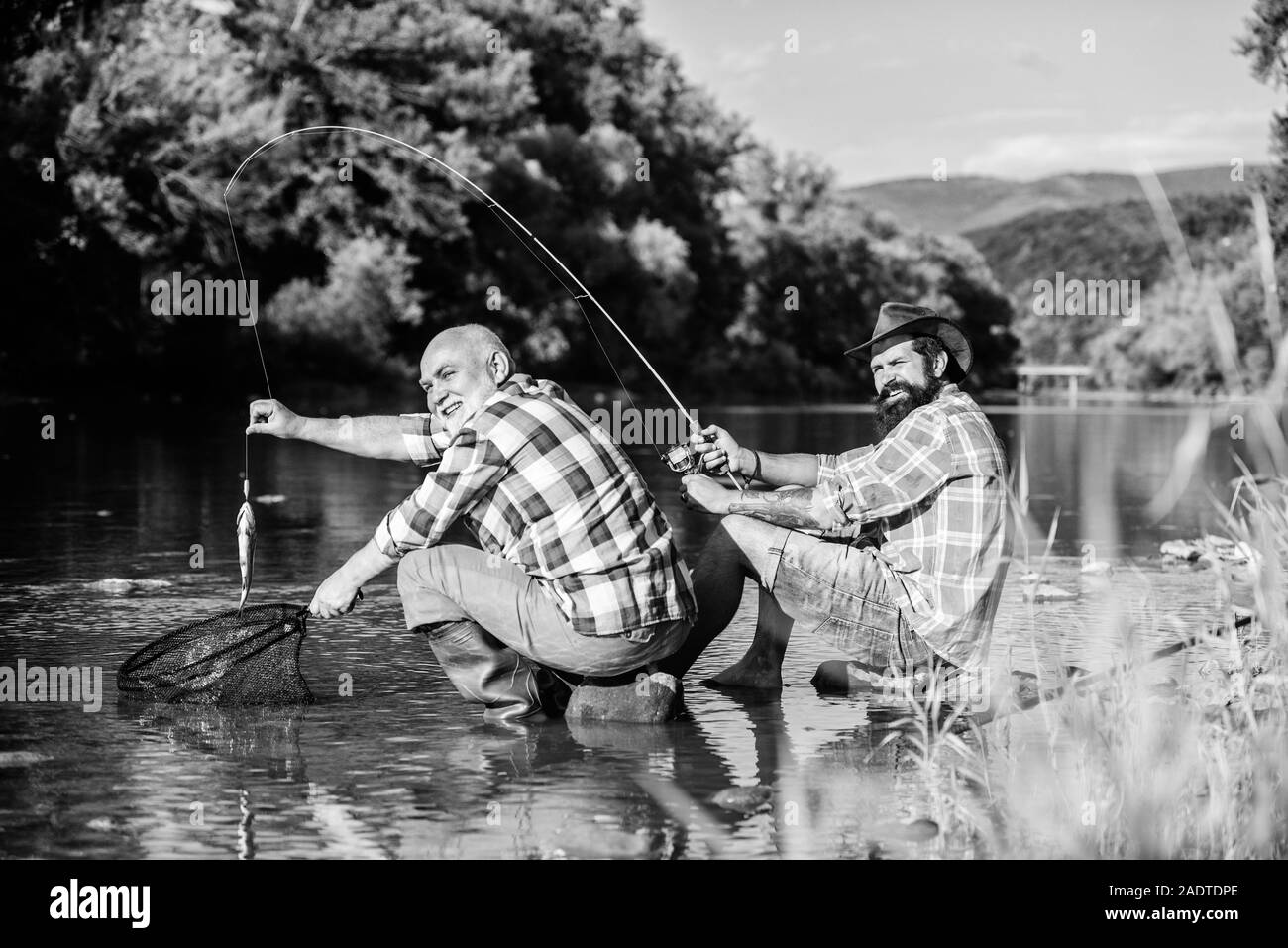 Poaching crime and fishing license. Black market caviar. Poachers fishing. Trap for fish. Men