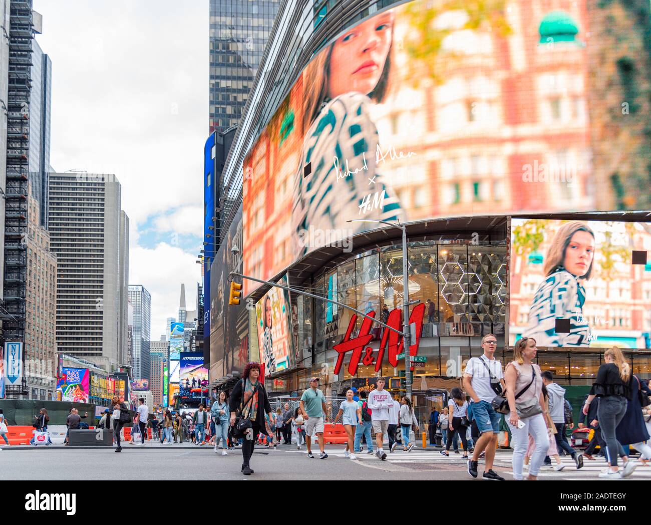 Manhattan New York Color Image Crowded with many people walking Times Square with huge number of LED signs, is a symbol of New York City in Manhattan Stock Photo