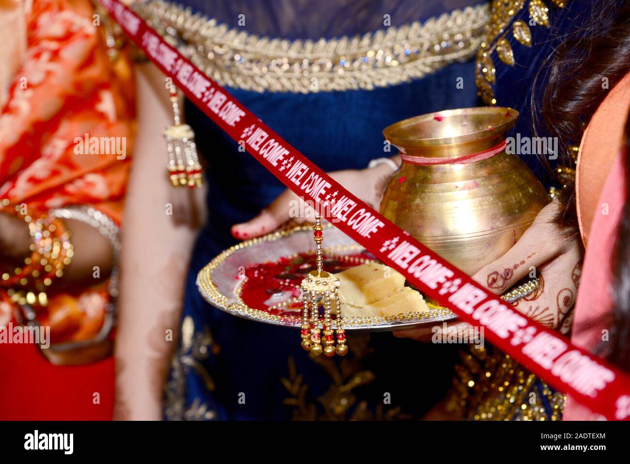 Welcome Rituals Indian bridesmaid wedding baraat welcome ritual ceremony Stock Photo ...