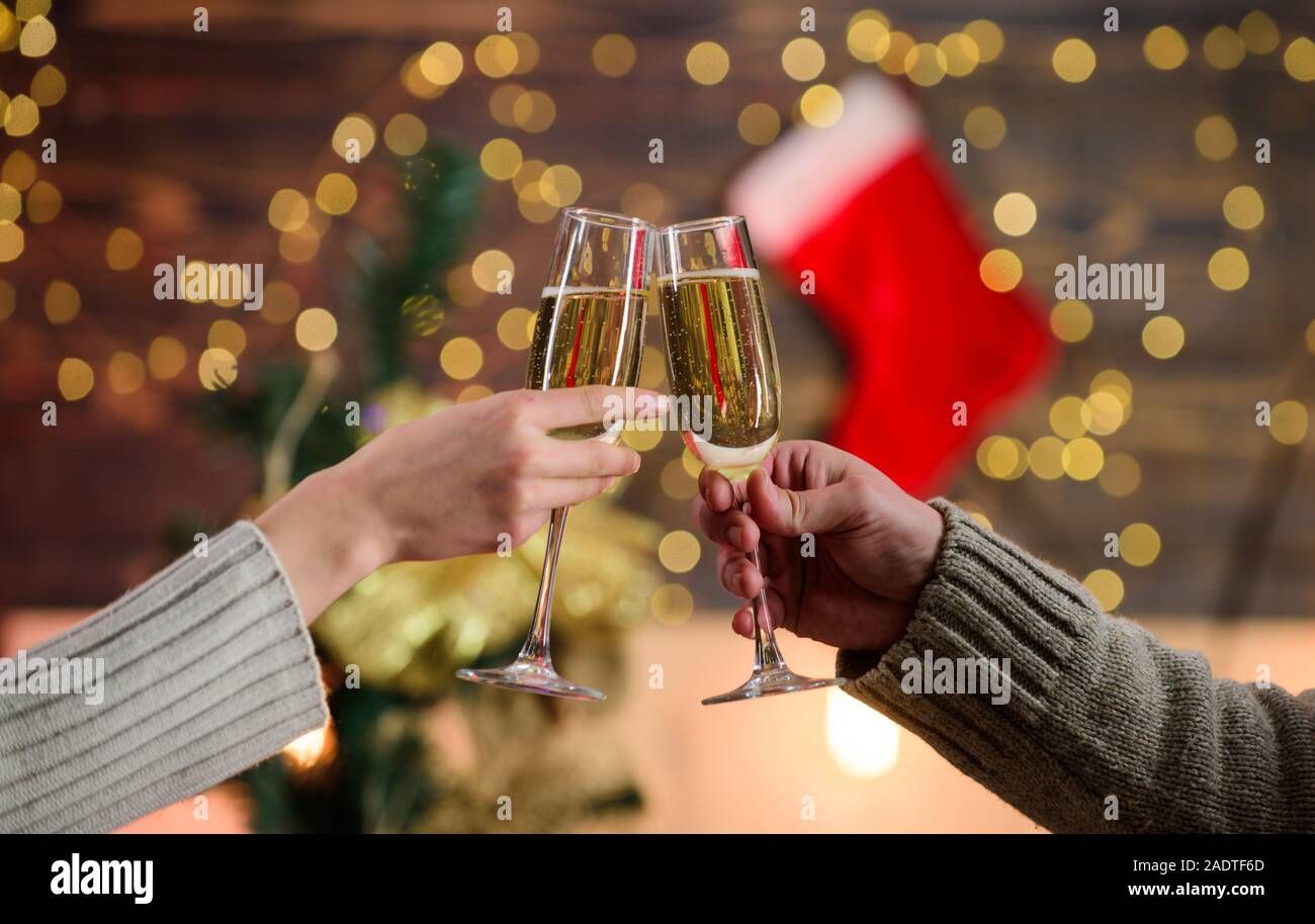Cheers concept. New year tradition. Glass filled sparkling wine or