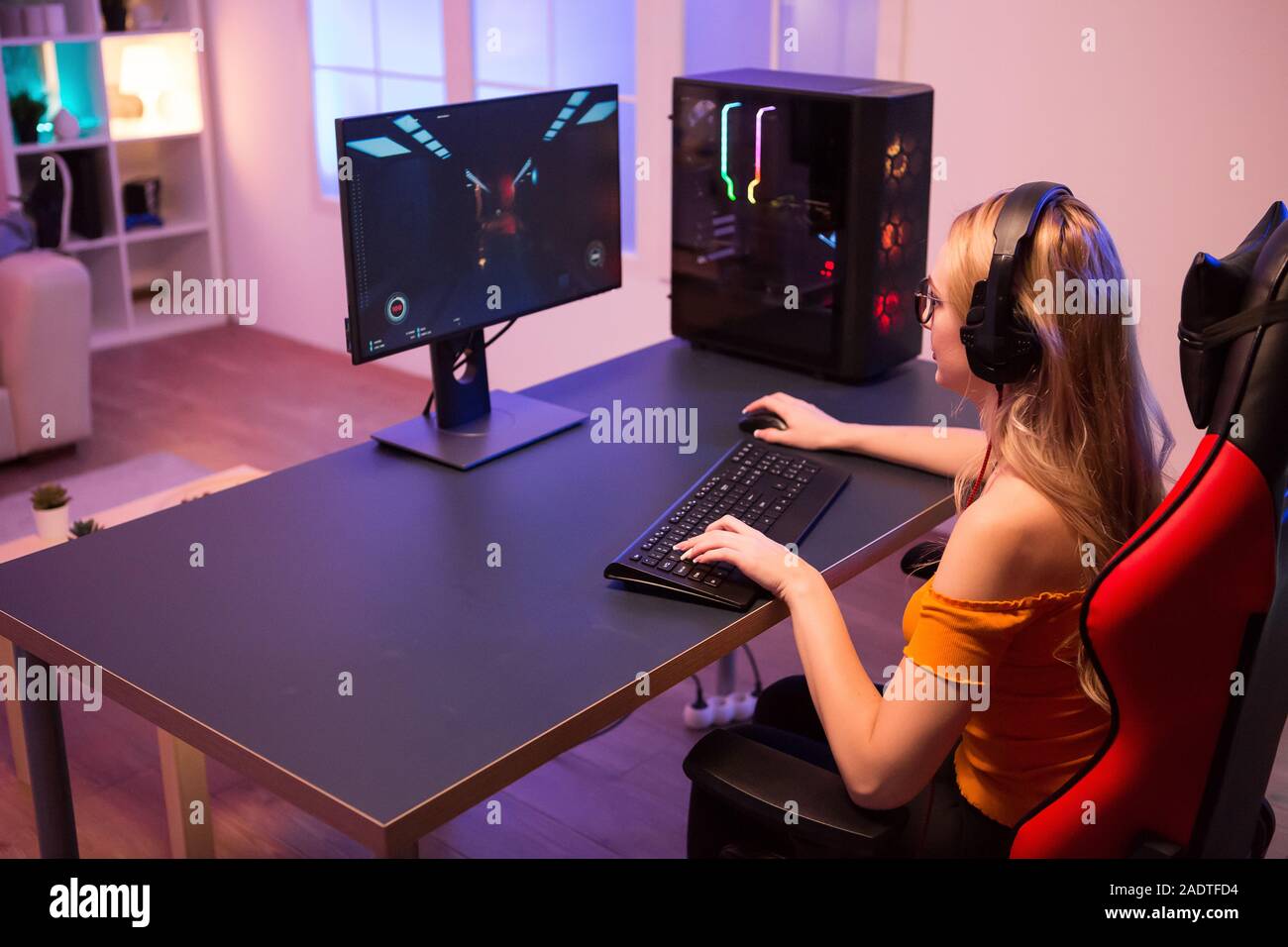 Girl Relaxing Playing Games On Computer And Sitting On A Gaming
