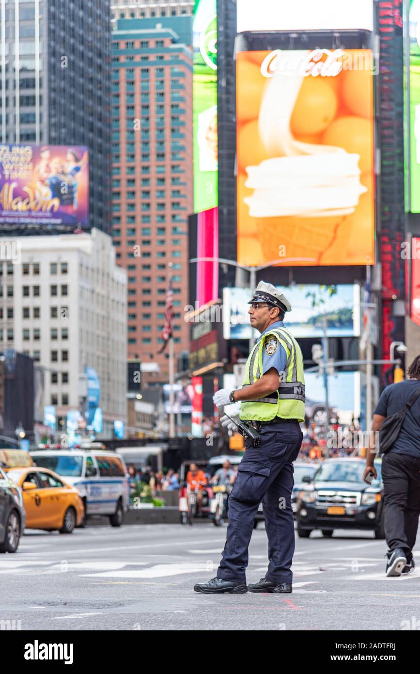 Manhattan new york color image New York traffic police man directing traffic Manhattan Stock Photo