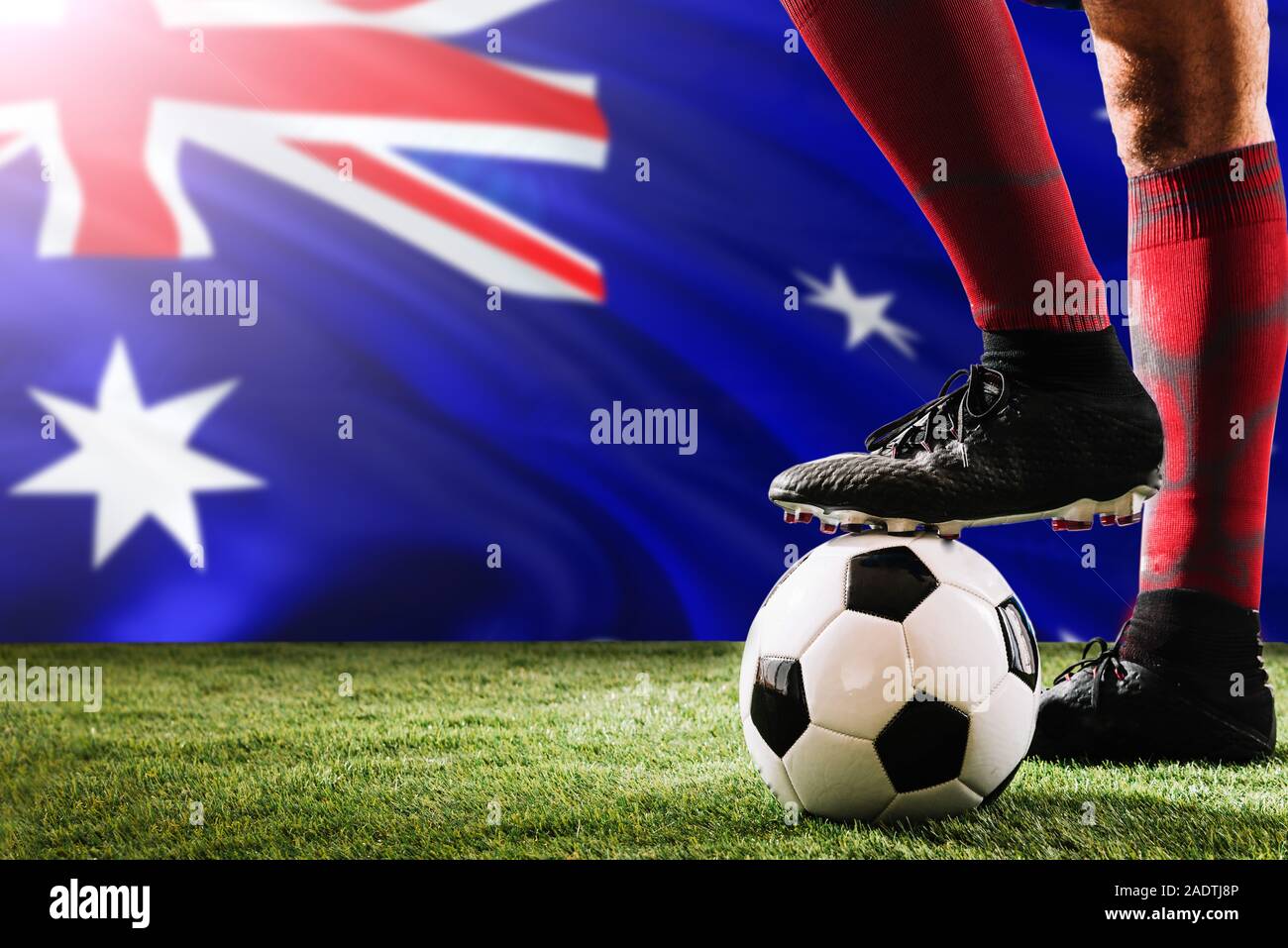 Close Up Legs Of Australia Football Team Player In Red Socks