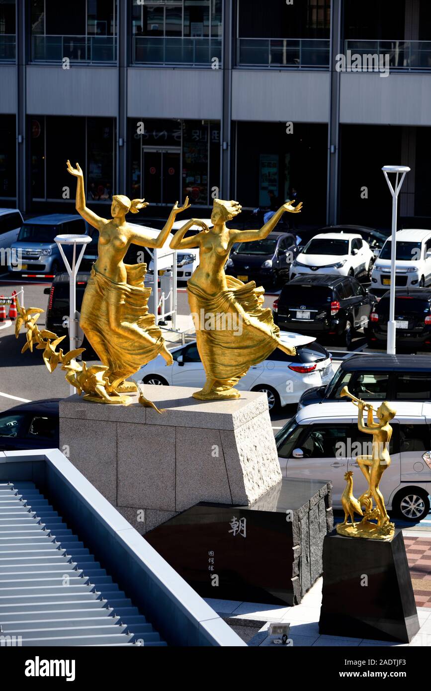 Gold painted statues at JR Station Hiroshima Stock Photo - Alamy