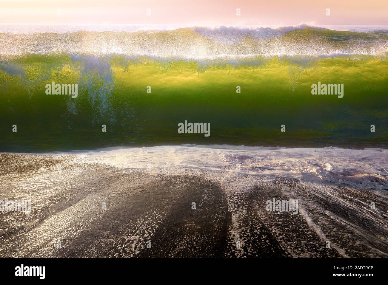 Big waves crash on beach hi-res stock photography and images - Alamy