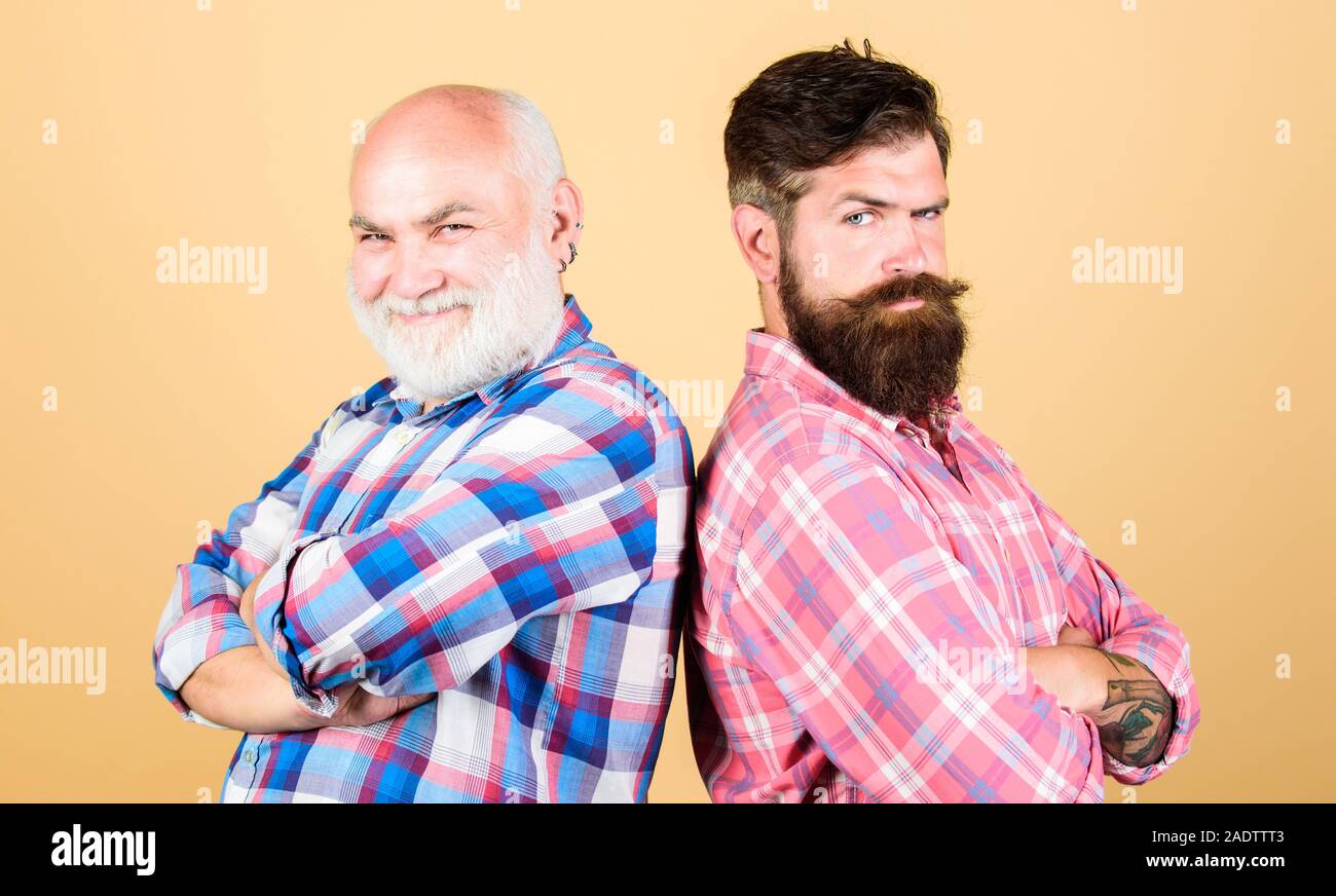 Bearded friends. Family team. Brutal guys with long beard. Barber well ...