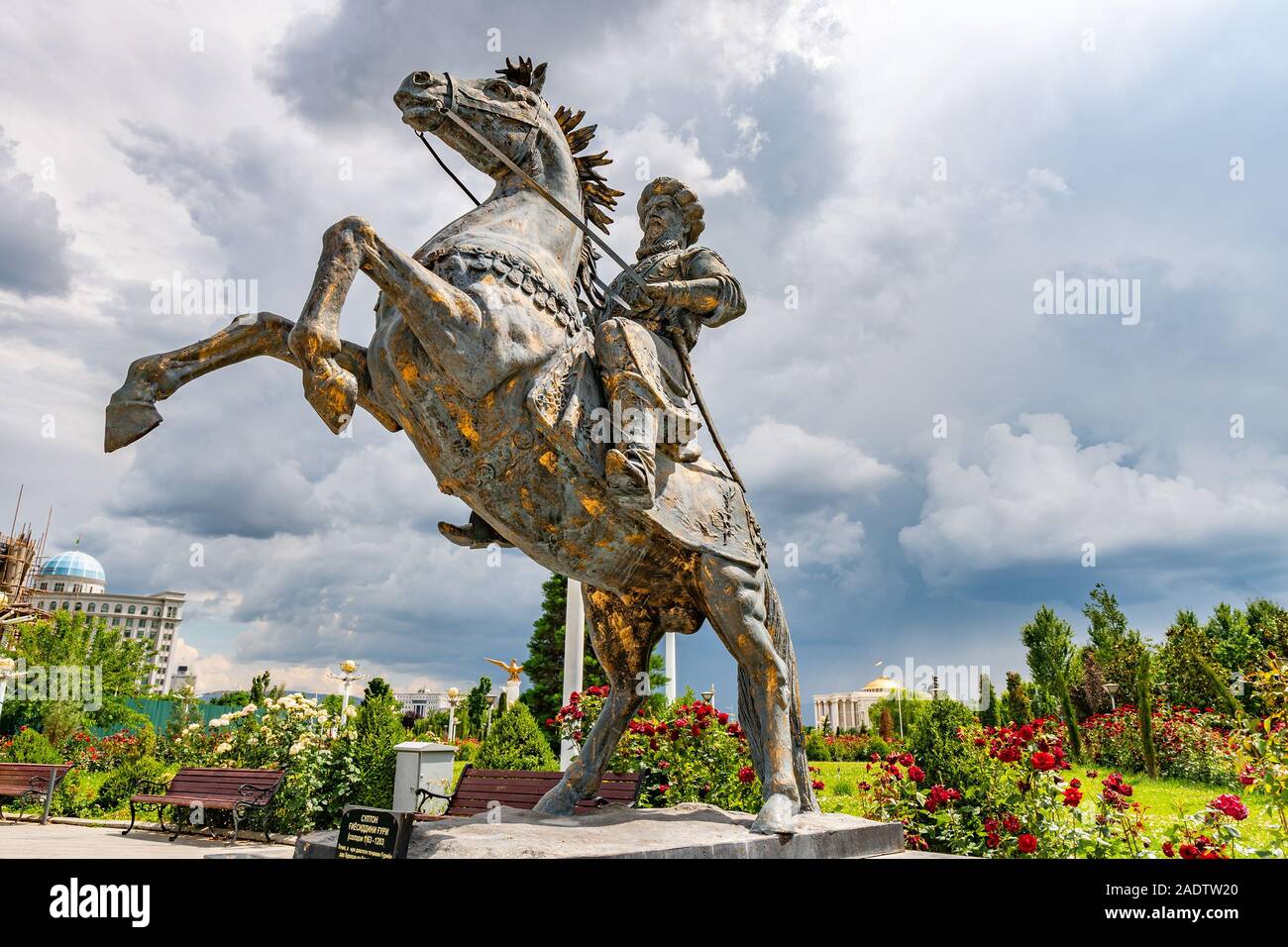 Dushanbe Flag Pole Park Picturesque View of Tajikistan National Museum with Giyosiddin Guri Statue on a Sunny Blue Sky Day Stock Photo