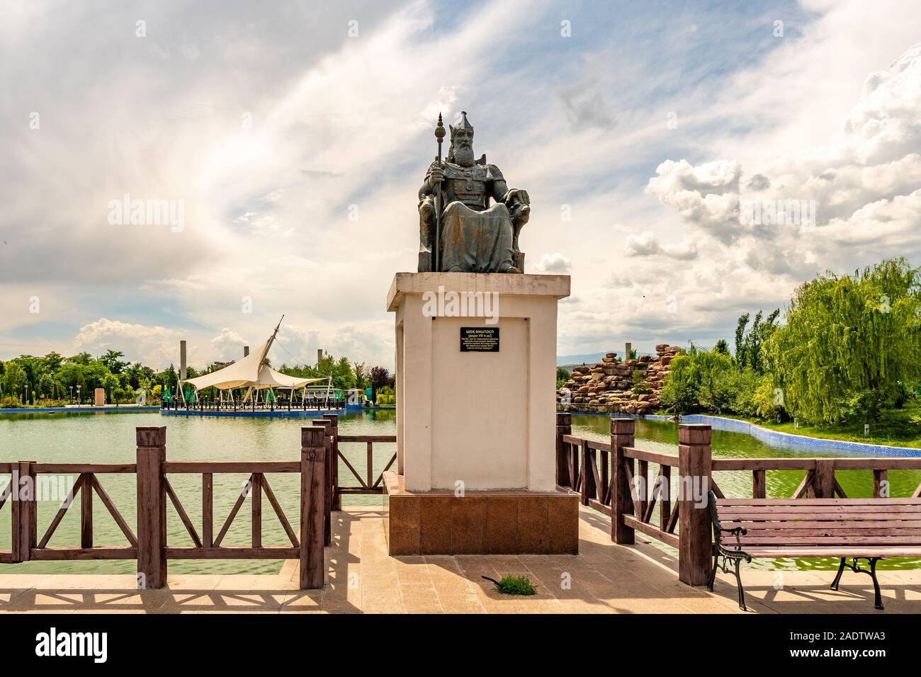 Dushanbe Flag Pole Park Lake Picturesque View of King Vishtaspa Statue on a Cloudy Blue Sky Day Stock Photo