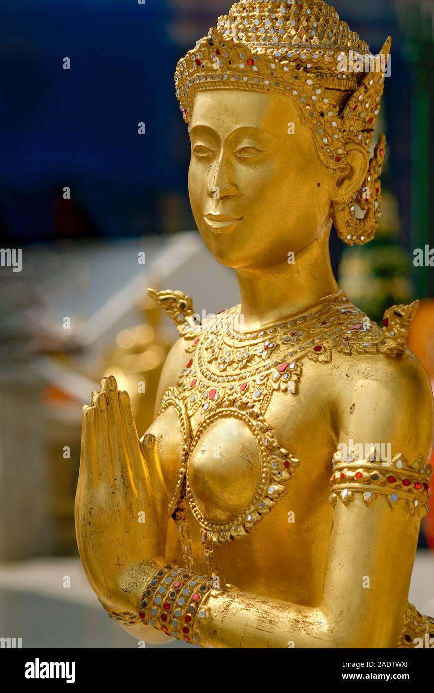 Golden Thai Kinnaree Sculpture, half human half bird,at the Grand Palace, Thailand Stock Photo