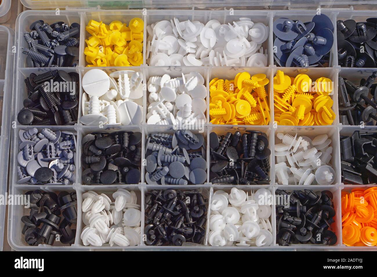 Various small plastic car parts for interior Stock Photo Alamy