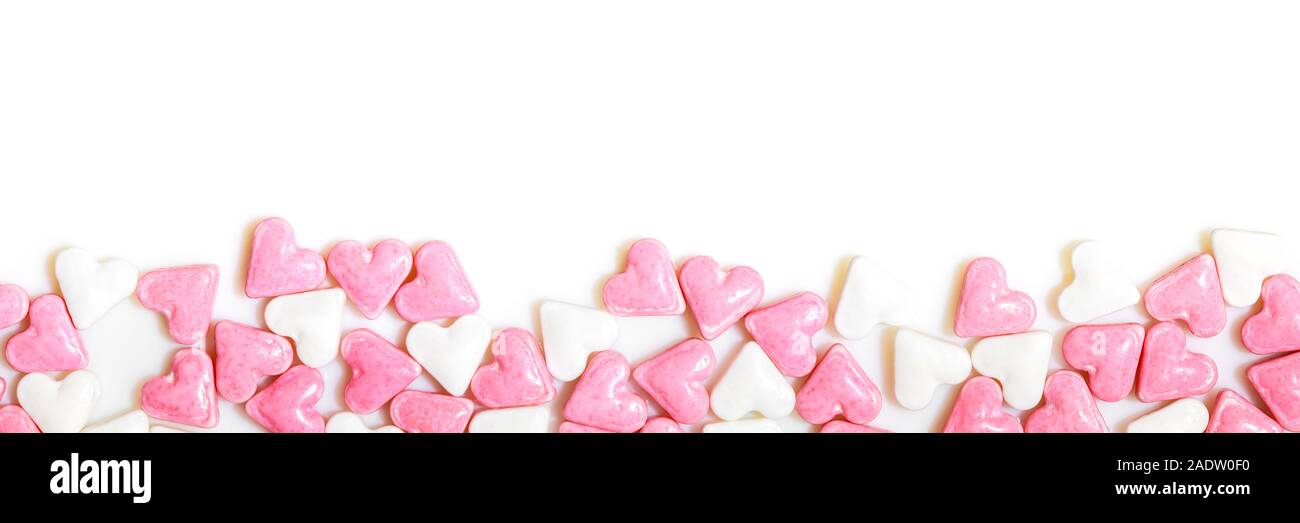 Header, white and pink sugar hearts with copyspace, concept sweet love Stock Photo