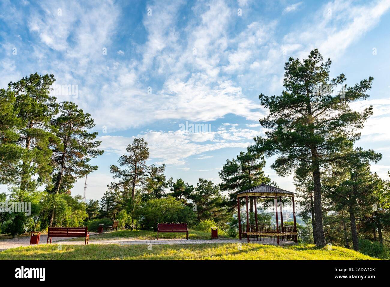 Dushanbe Victory Park Pobedy Picturesque Breathtaking View of a Sitting Bench and Pavilion on a Sunset Blue Sky Day Stock Photo