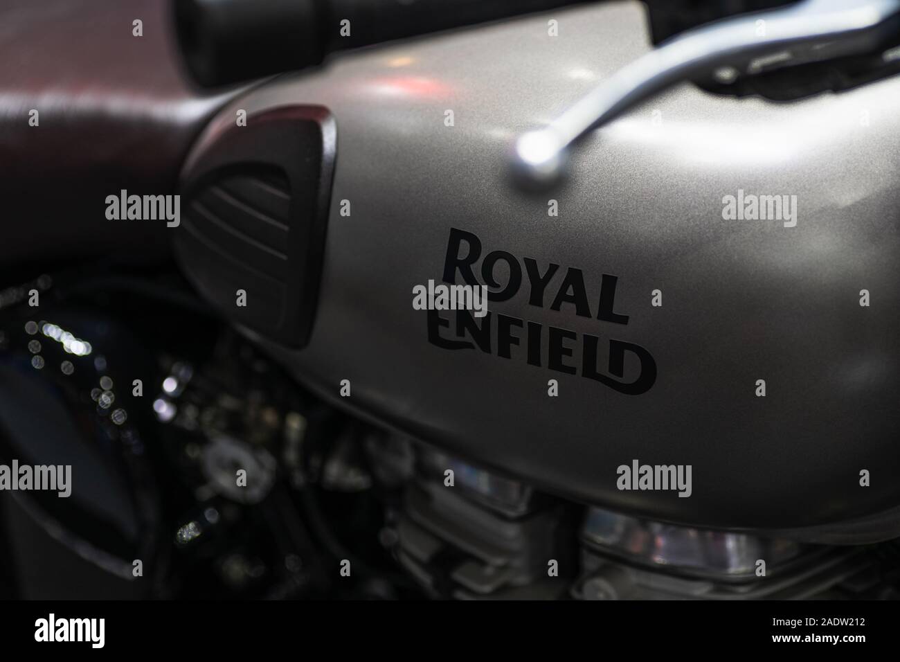 Bangkok, Thailand - Decemeber 5, 2019 : Royal Enfield logo on the Fuel tank of sports motorbike at a car show. Royal Enfield motorcycle is originally Stock Photo