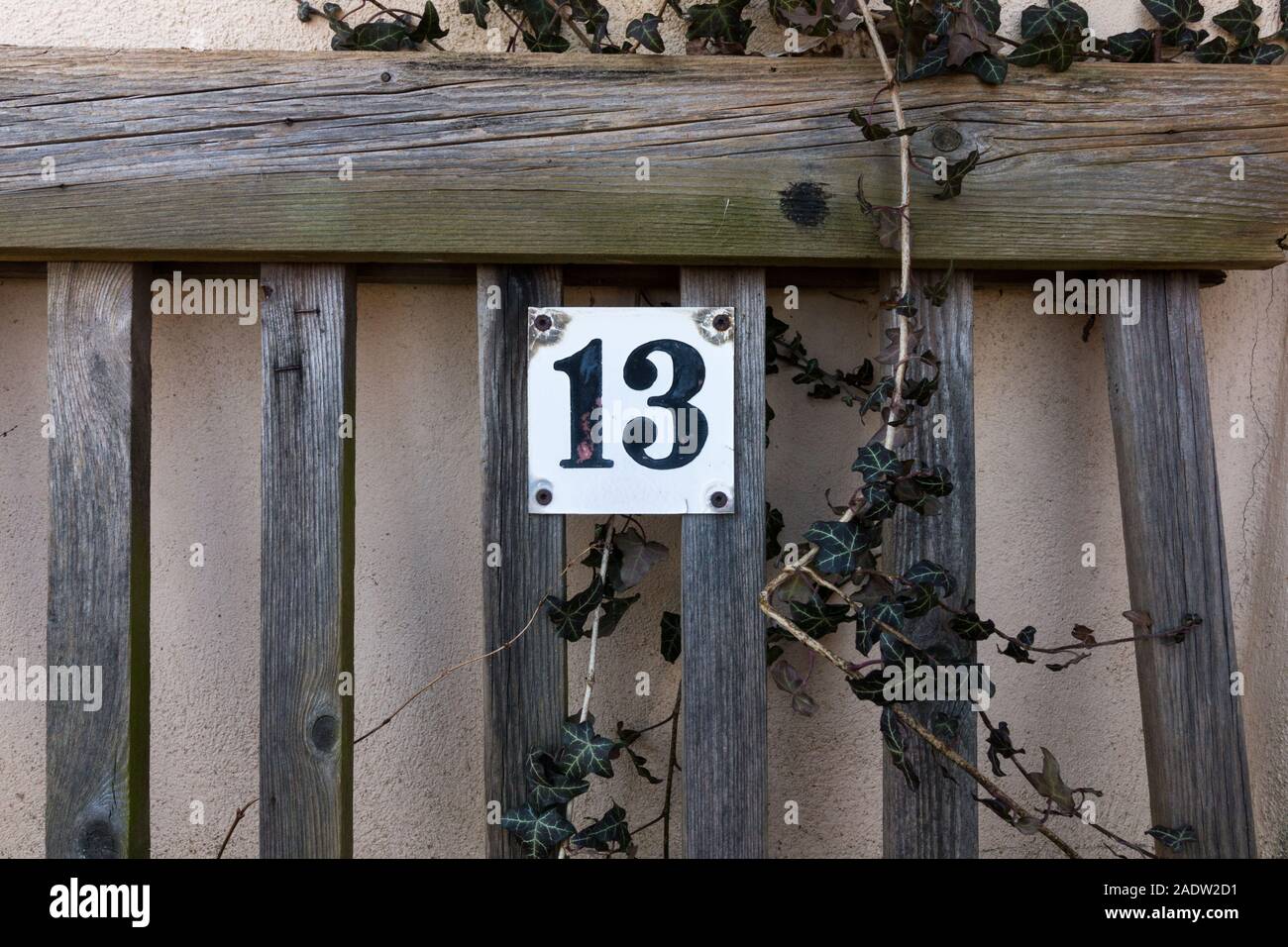 Gera, Germany. 01st Mar, 2018. The number 13 stands on a park bench. In popular belief it is considered an unlucky number. Especially on Friday, the thirteenth. Credit: Stephan Schulz/dpa-Zentralbild/ZB/dpa/Alamy Live News Stock Photo