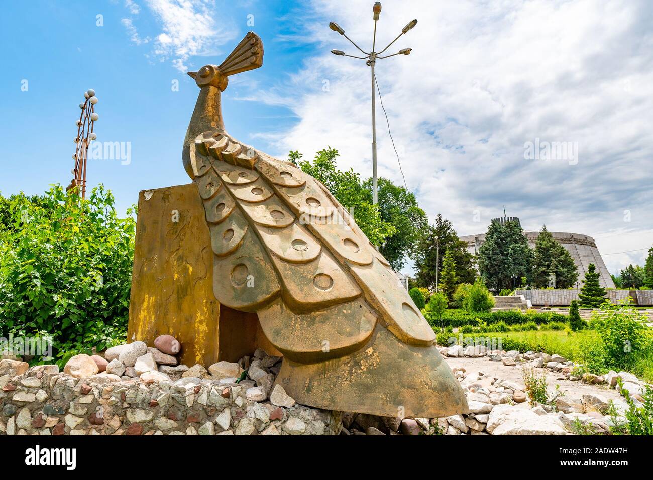 Dushanbe Concert Complex Kokhi Borbad Picturesque View of a Peacock Statue at Park on a Cloudy Rainy Day Stock Photo