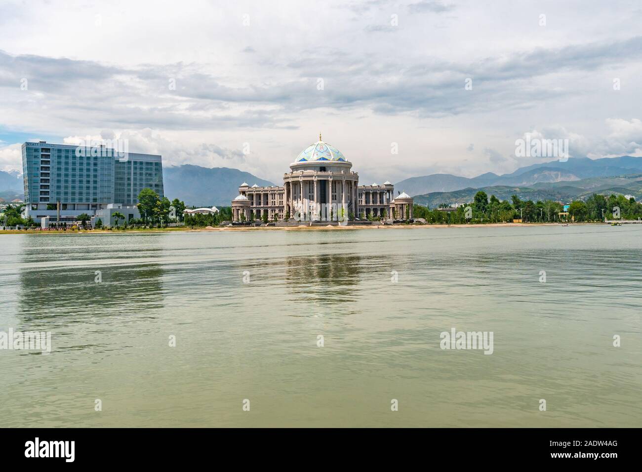Dushanbe Komsomolskoe Lake Picturesque View of Hyatt Regency Hotel and Navruz Palace on a Cloudy Rainy Day Stock Photo