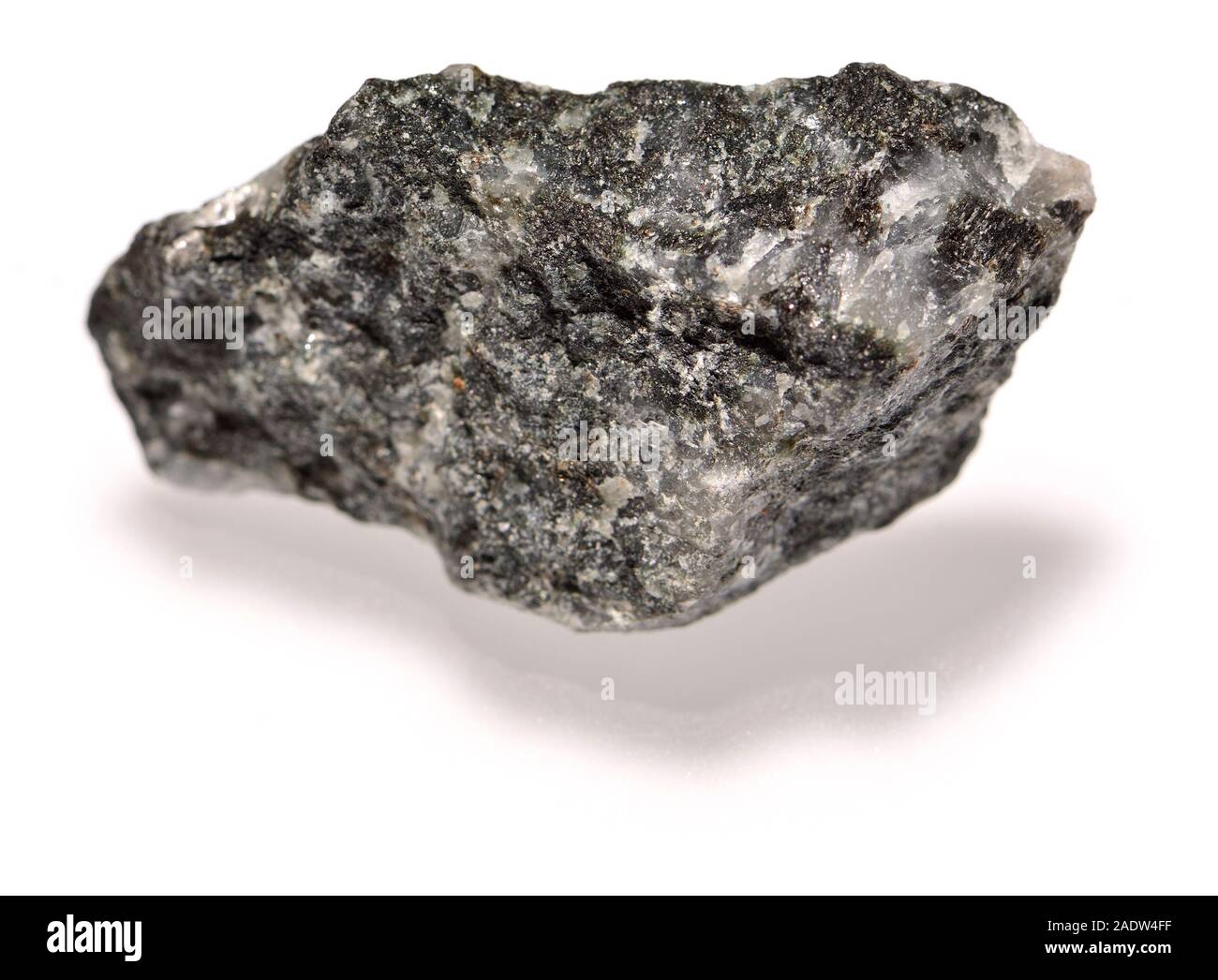 Gabbro - coarse-grained, intrusive igneous rock formed from the slow cooling of magnesium-rich and iron-rich magma Stock Photo