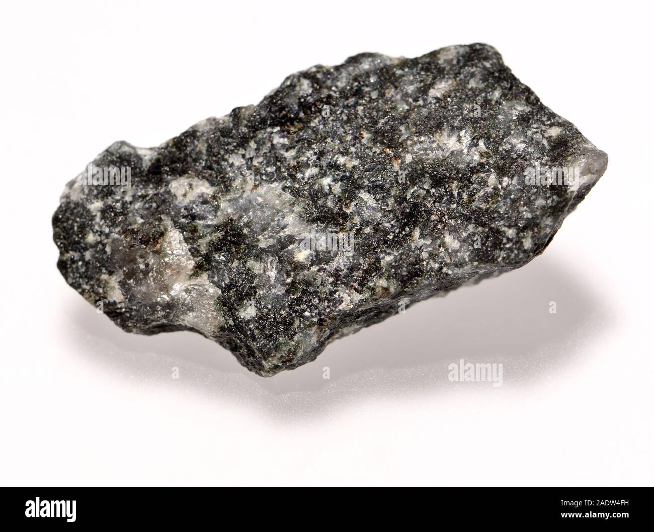 Gabbro - coarse-grained, intrusive igneous rock formed from the slow cooling of magnesium-rich and iron-rich magma Stock Photo
