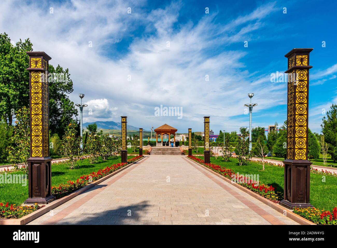 Dushanbe Youth Park Picturesque Leading Lines View of Pavilion with Street Lights on a Sunny Blue Sky Day Stock Photo