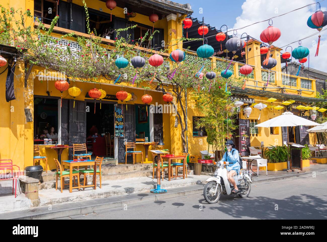 Shops selling clothing and souvenirs along the riverfront,  Hoi An Vietnam Stock Photo