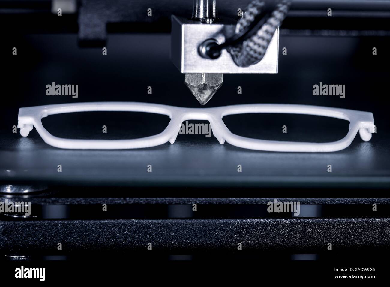 Glasses frame is printed with a 3D printer, concepts such as cheap eyeglass  frames or relief of the health insurance, new production methods of optici  Stock Photo - Alamy