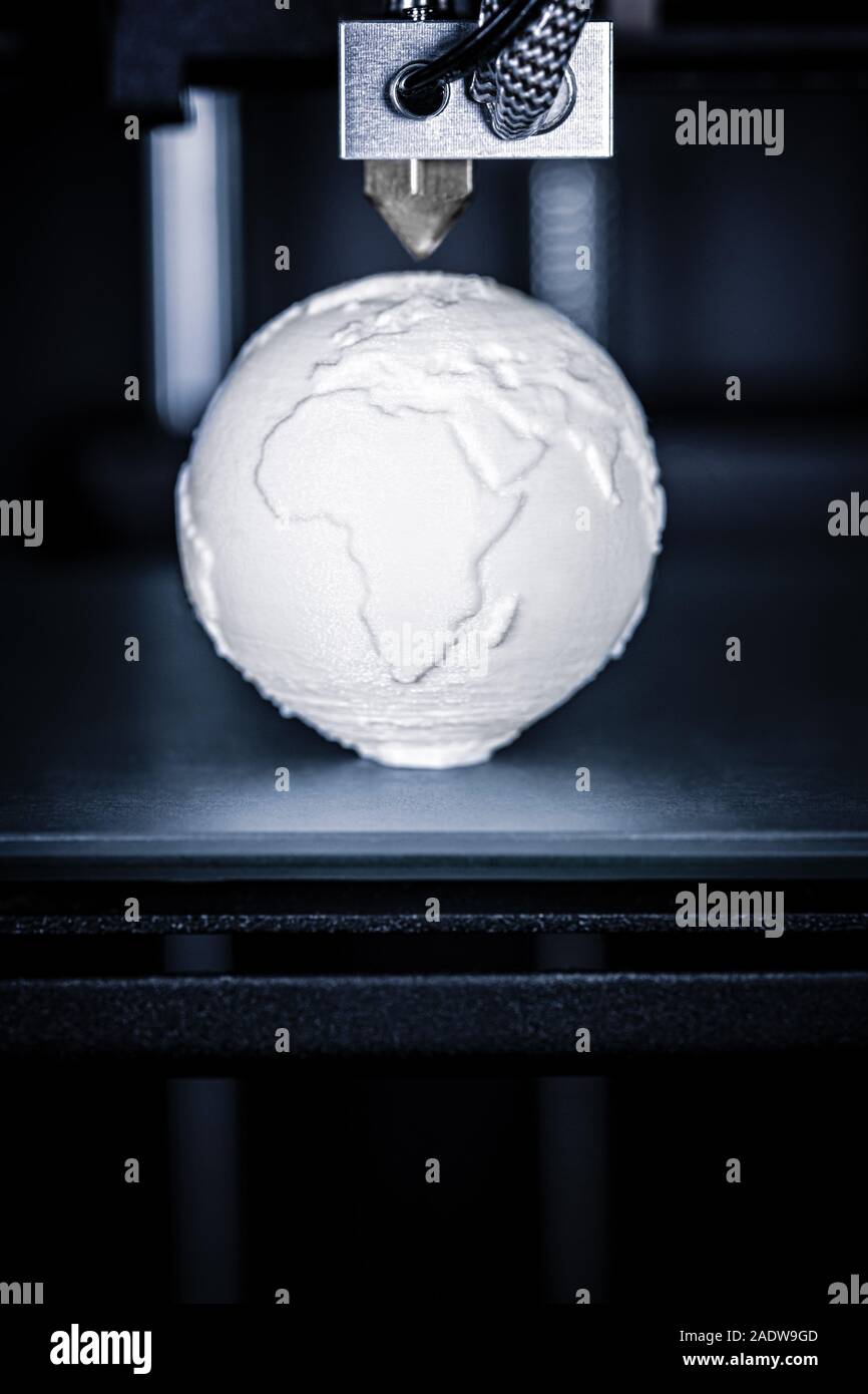 Globe is or has been printed in a 3D printer, concepts such as globalization and advanced technology Stock Photo