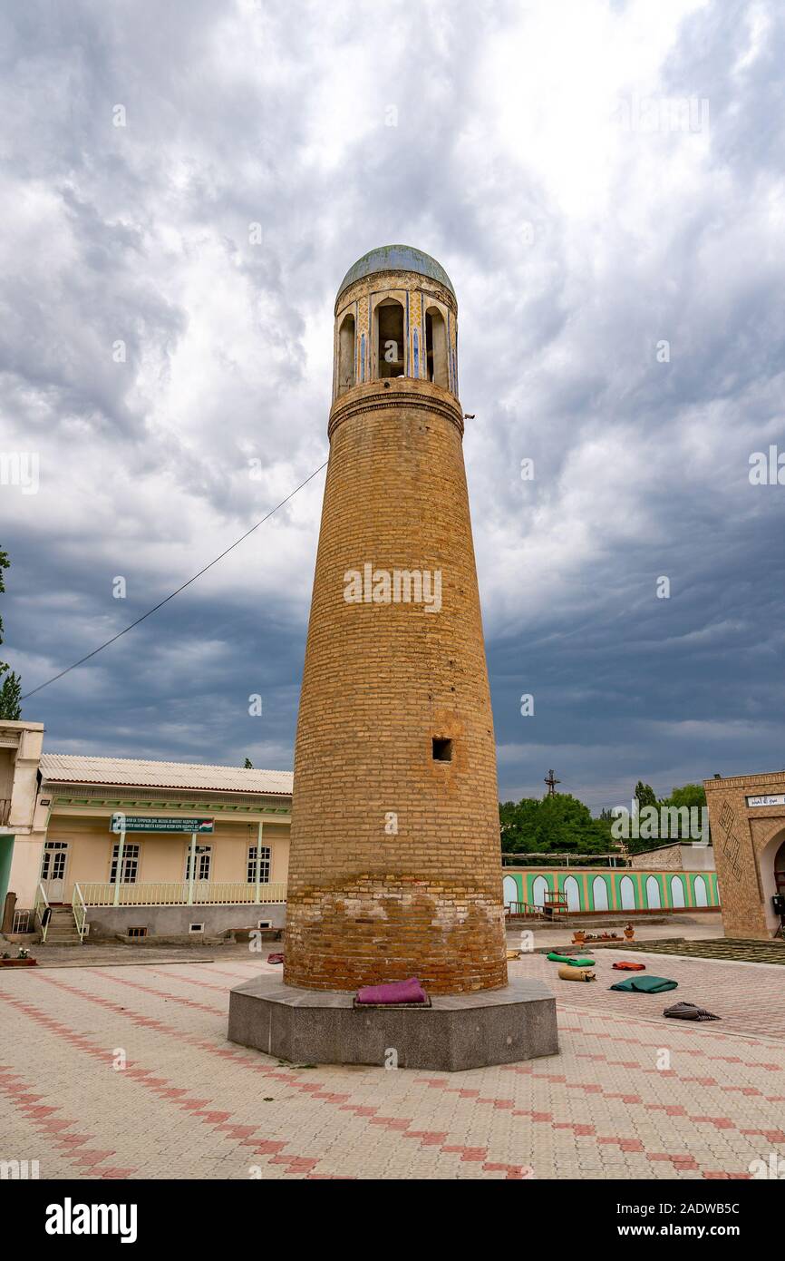 Isfara Abdullo Khan Mosque Madrasa Picturesque View of Minaret Tower on a Cloudy Rainy Day Stock Photo