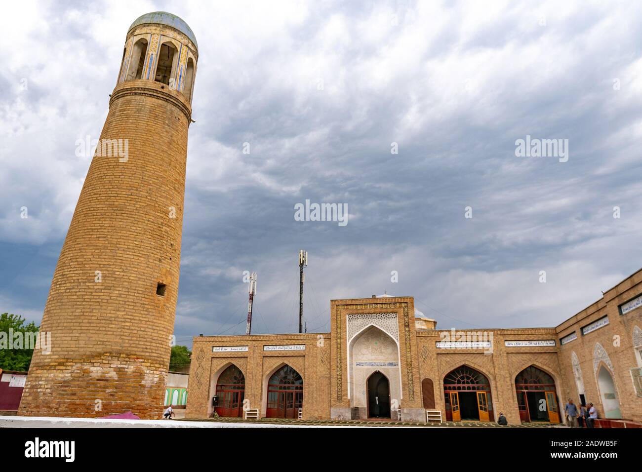 Isfara Abdullo Khan Mosque Madrasa Picturesque View of Minaret Tower and Iwan on a Cloudy Rainy Day Stock Photo