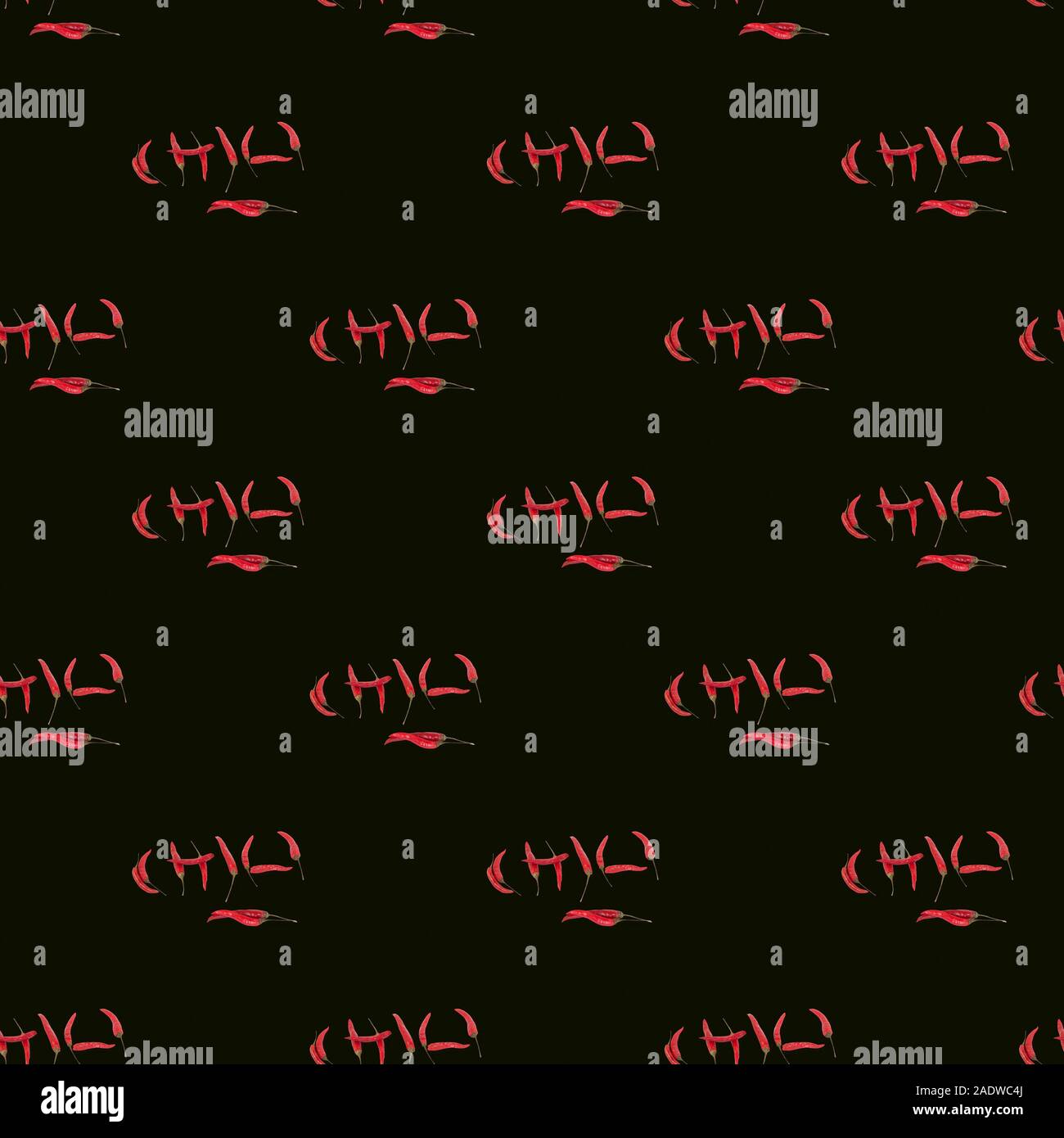 Seamless pattern red chili peppers on a black background Stock Photo