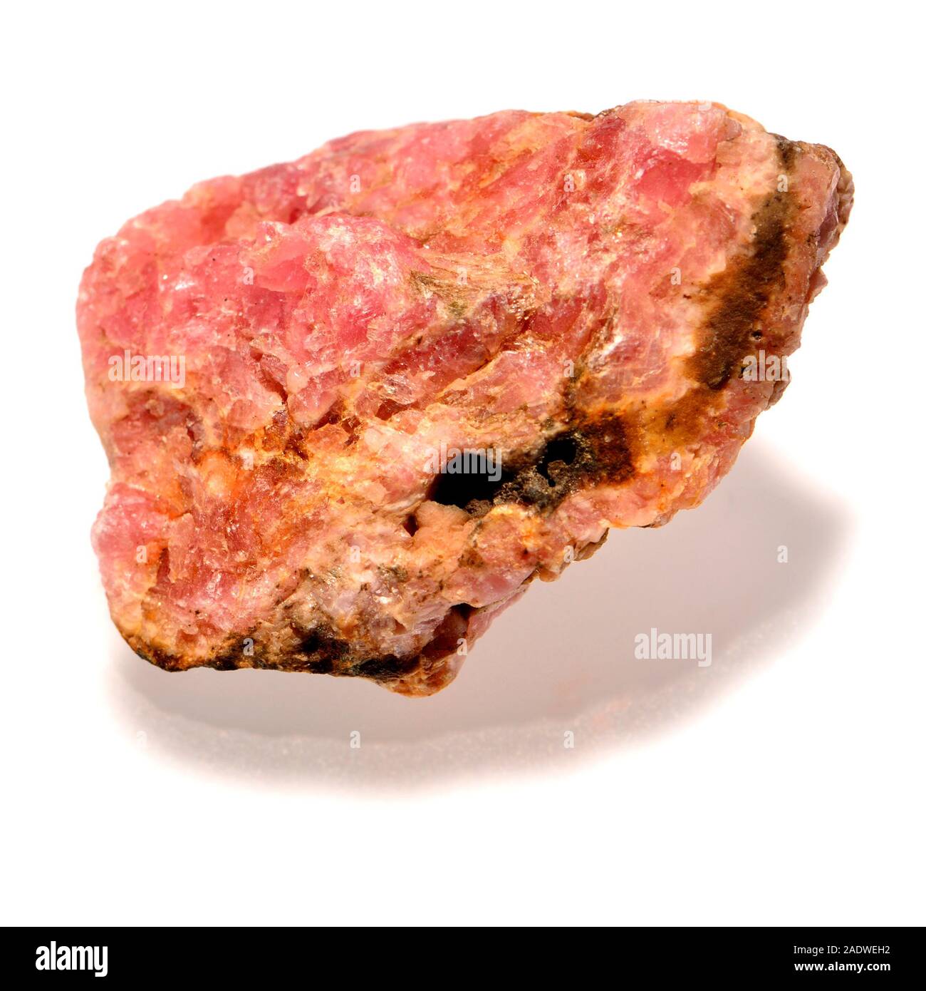 Rhodochrosite - manganese carbonate mineral with chemical composition MnCO₃. Stock Photo