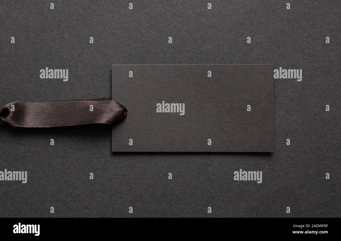 Download Black Friday Sale Concept Black Price Tag Blank Mockup With Satin Ribbon Isolated Against Black Background Vertical Copy Space Stock Photo Alamy PSD Mockup Templates