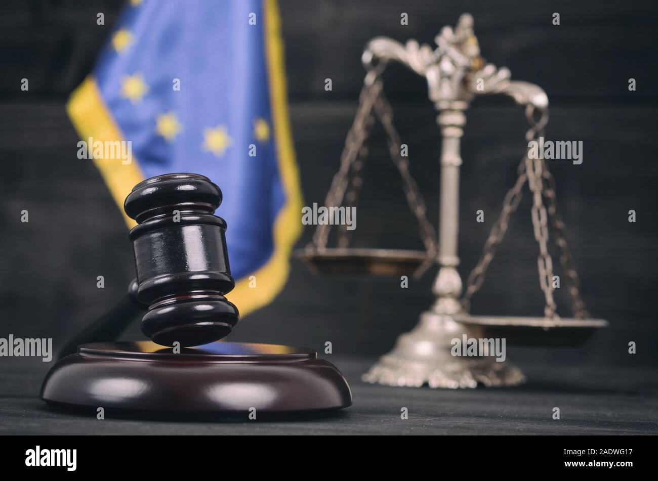 Law and Justice , Legality concept, Scales of Justice, Judge Gavel and Flag of the European Union on a black wooden background. Stock Photo