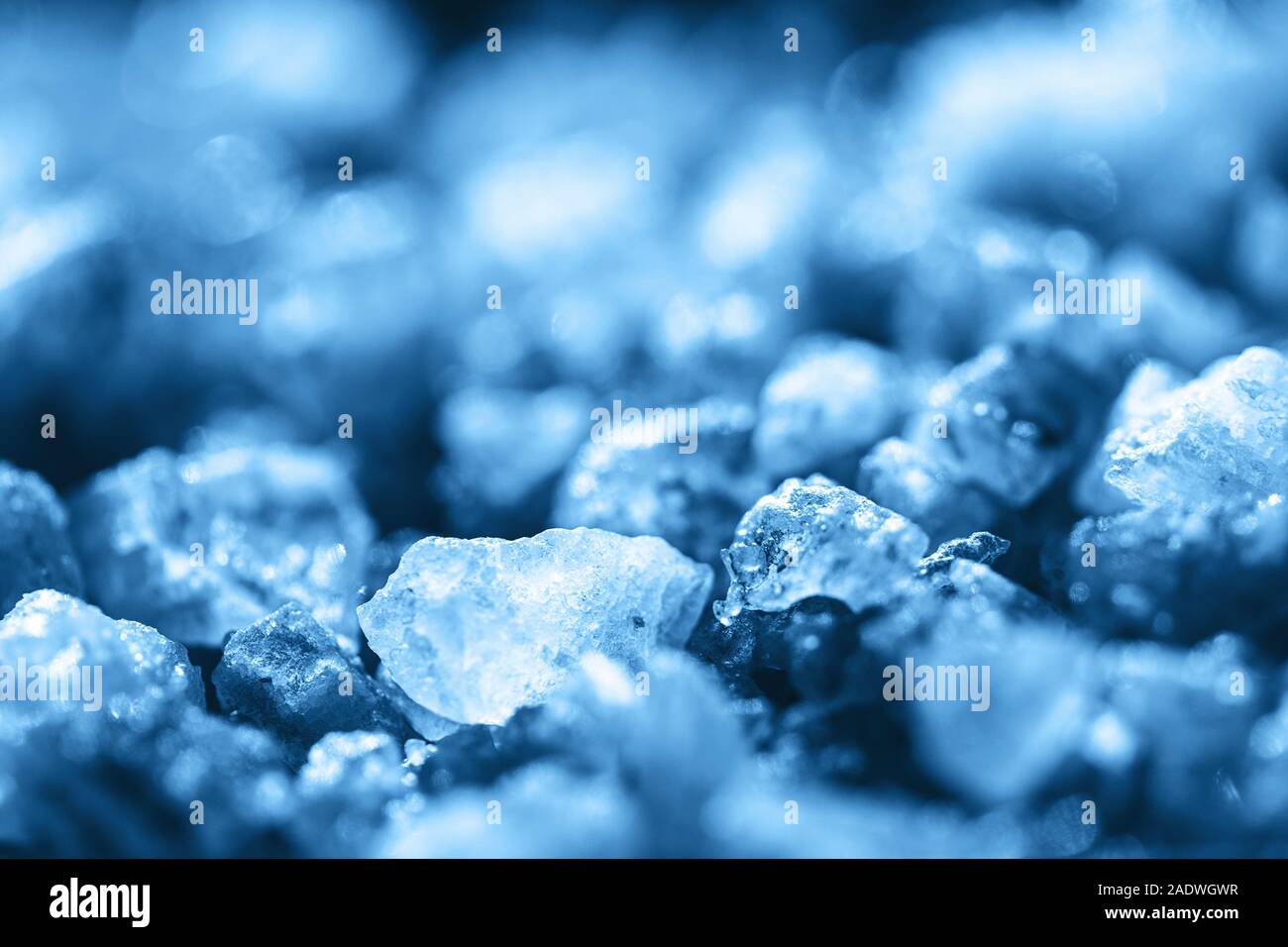 Blue crystals of natural sea salt with close-up background Stock Photo