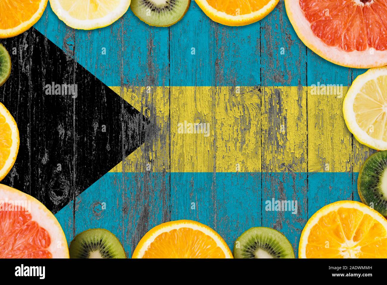 Bahamas food concept. Fresh fruits from traditional gardens. Cooking concept on wooden flag background. Stock Photo