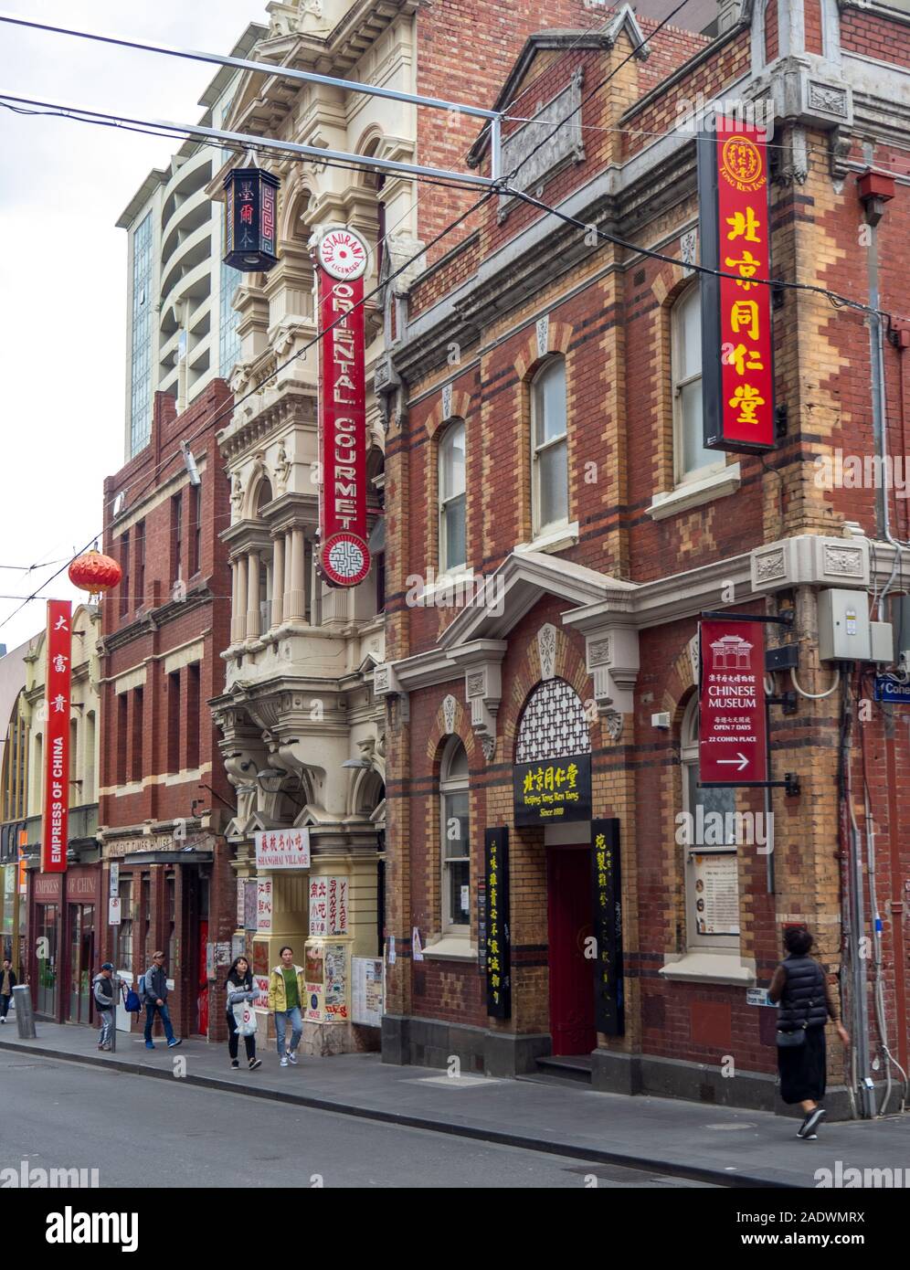 Pedestrians and shoppers in Chinatown Little Bourke Street Melbourne