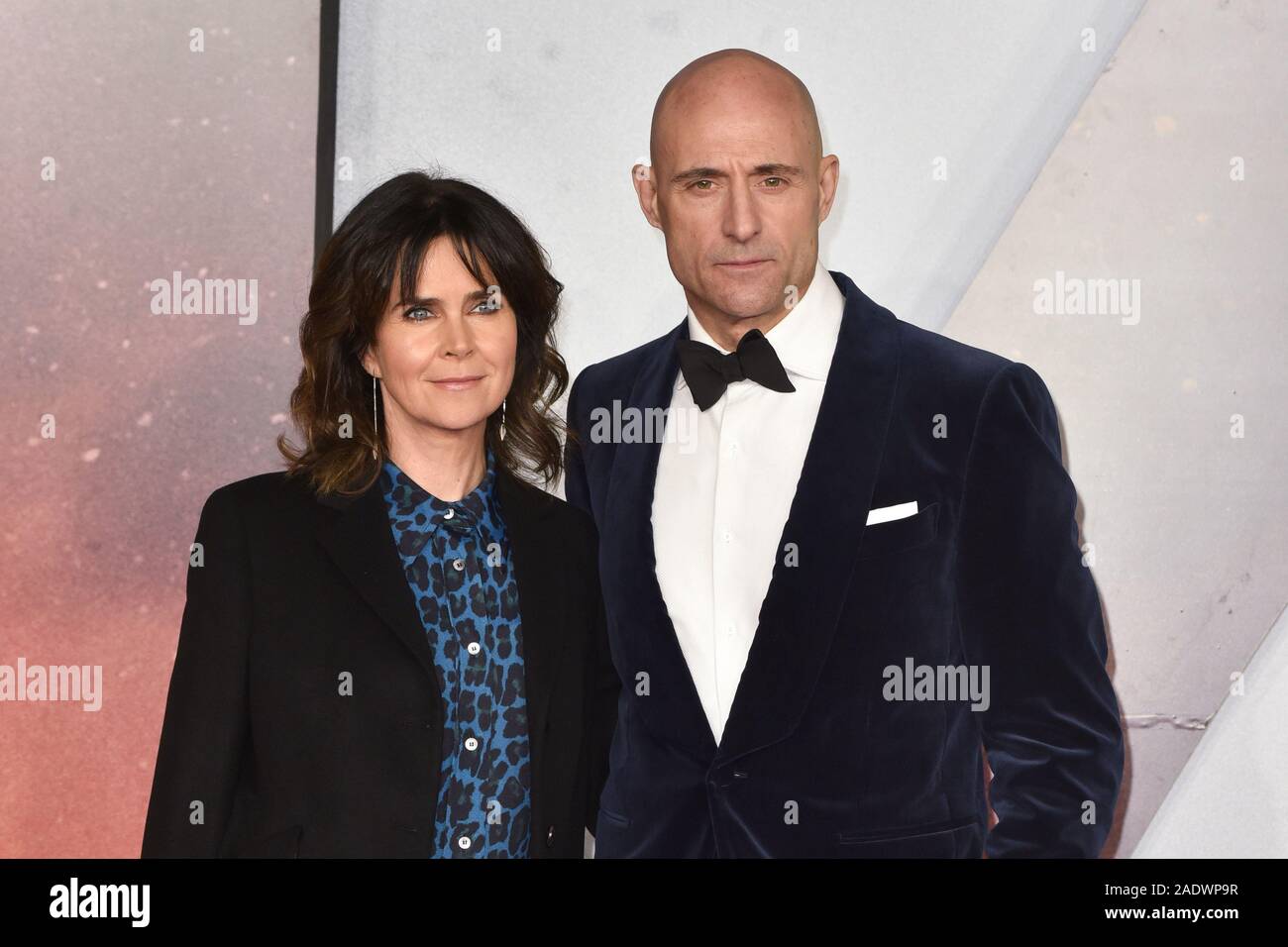 Liza Marshall and Mark Strong attend the World Premiere and Royal Performance of '1917' at Odeon Luxe Leicester Square in London. Stock Photo