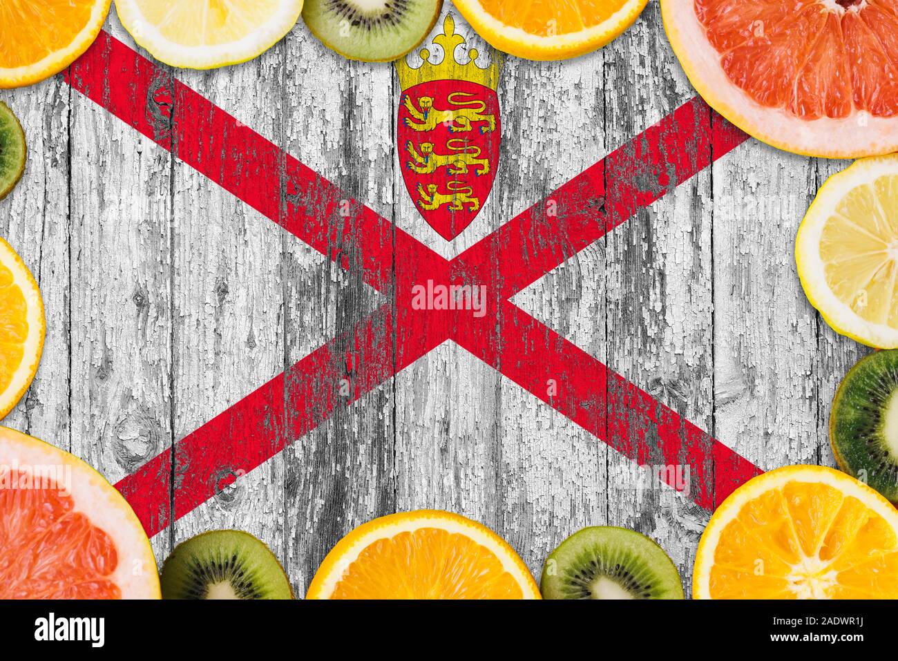 Jersey food concept. Fresh fruits from traditional gardens. Cooking concept on wooden flag