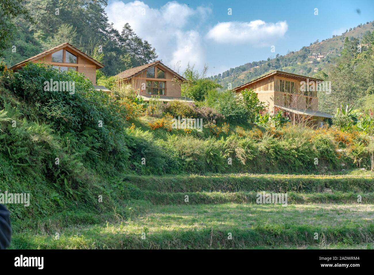Rammed Earth Cottages on Rural Nepal Farm with Blue Skies Stock Photo -  Alamy