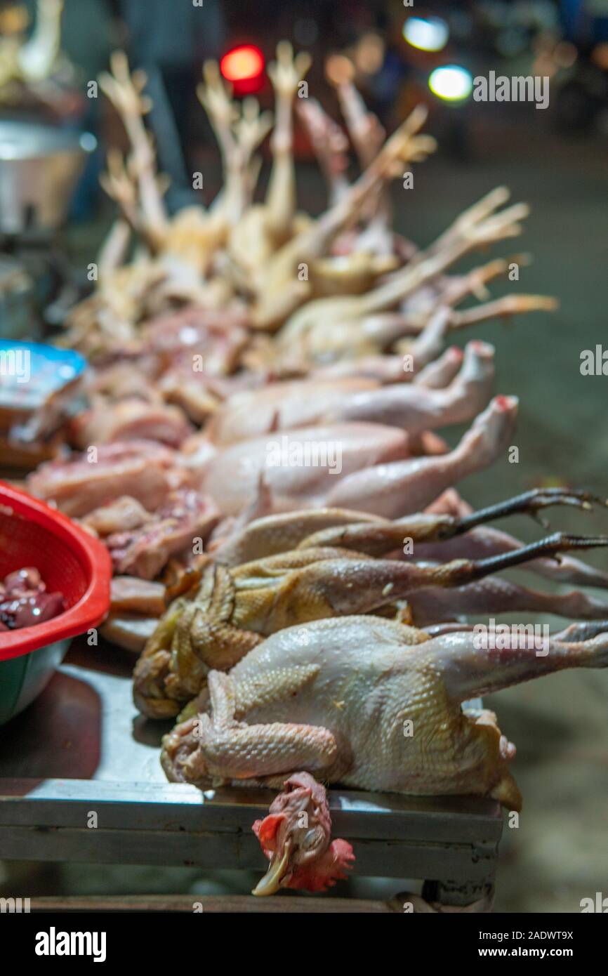 Dead chickens on sale by the side of the street in Nepal Stock Photo