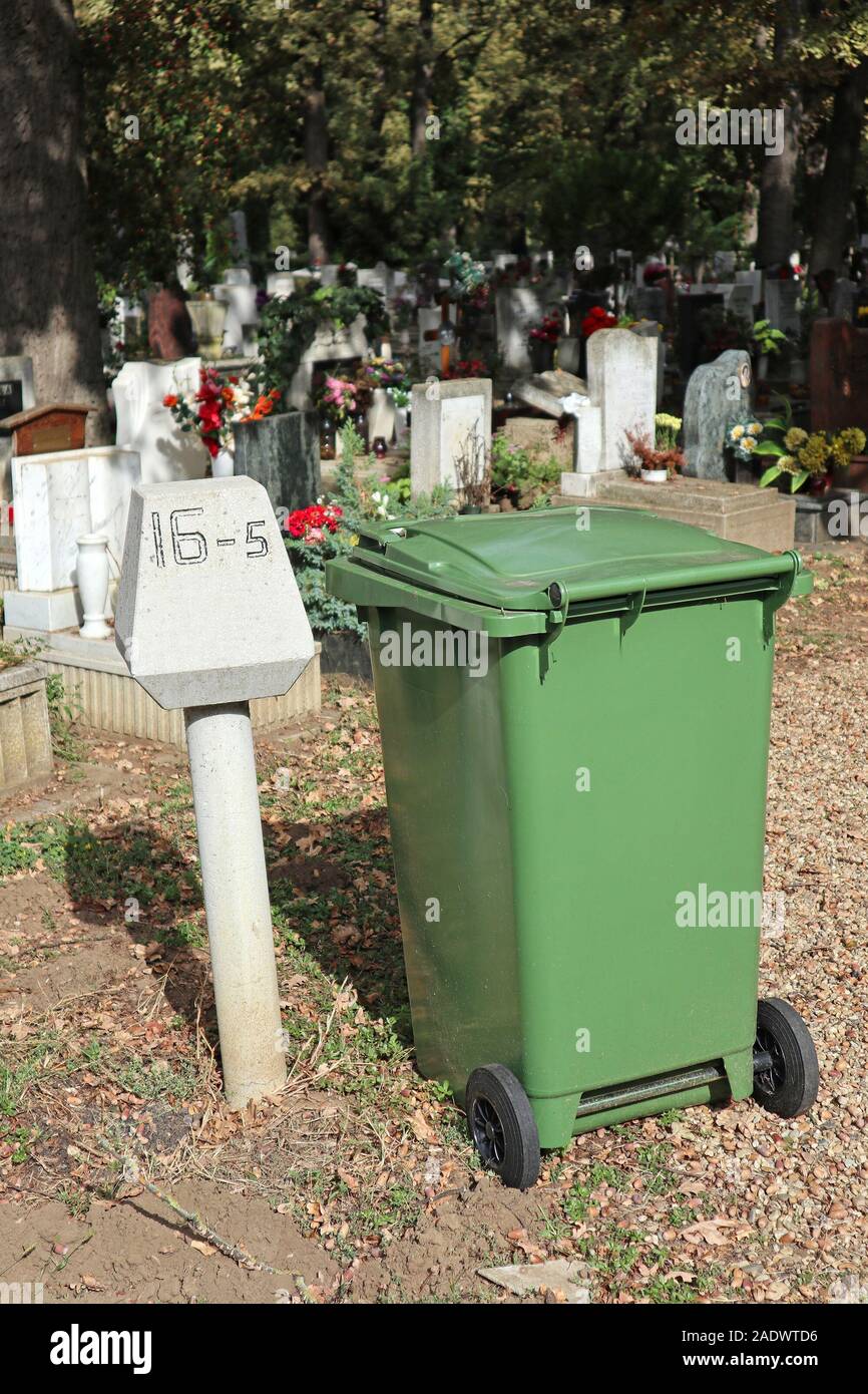 Garbage can in the public cemetery Stock Photo Alamy