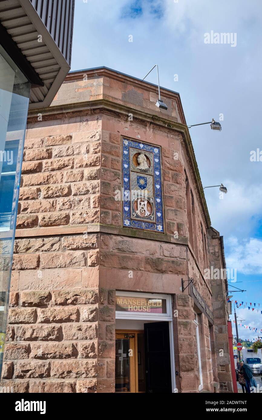 On the corner of Mansfield House on the High Street, a tiled plaque