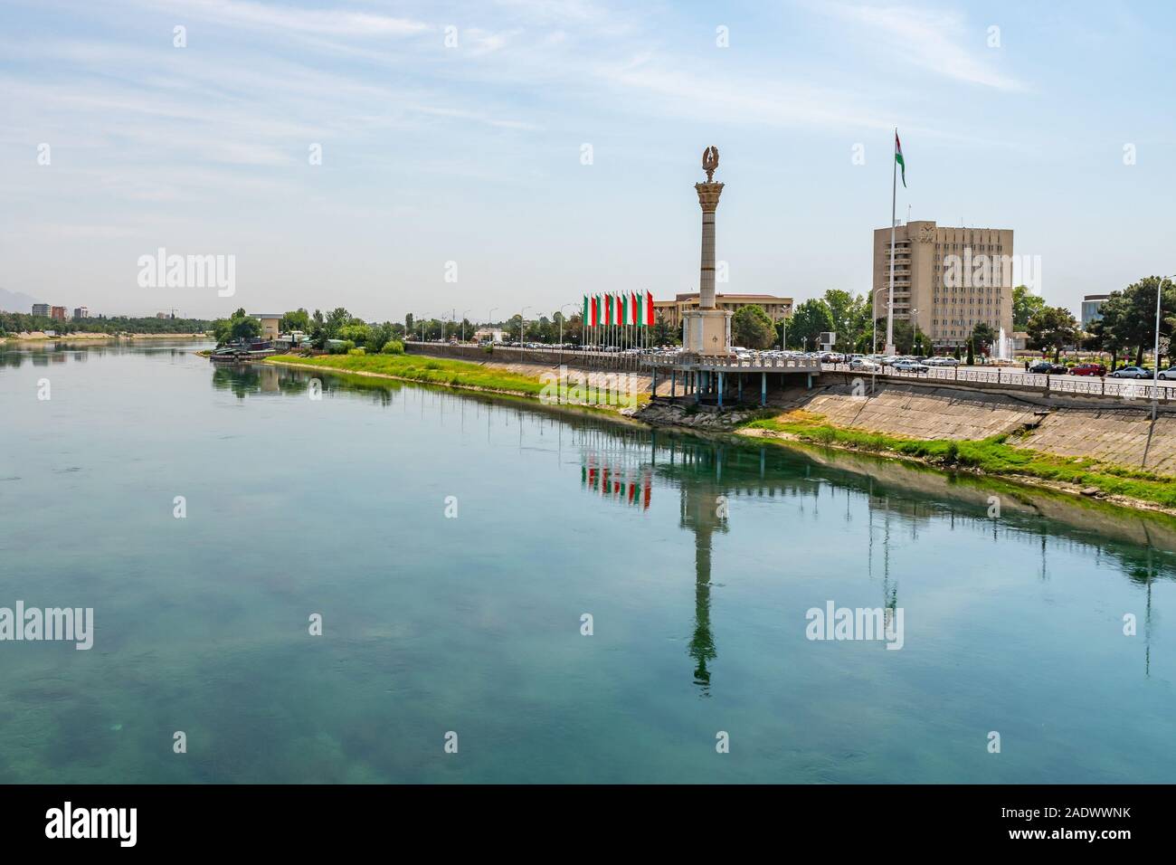 Khujand Stella with Patriotic Inscriptions and Tajikistan Coat of Arms on a Sunny Blue Sky Day Stock Photo