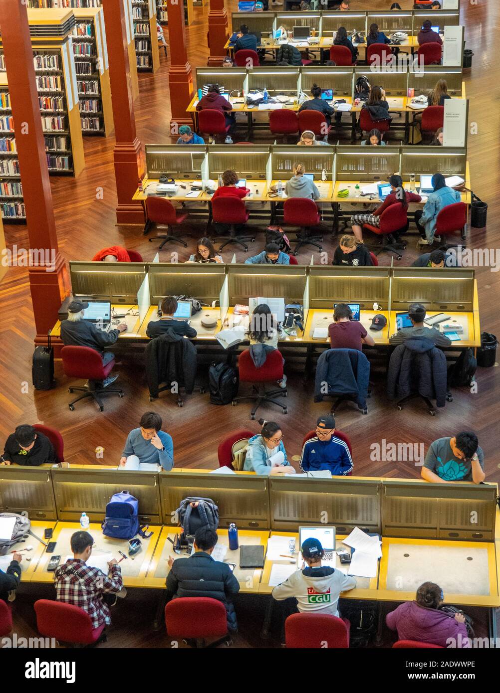Students studying in Redmond Barry Reading Room in State Library Victoria Melbourne Australia