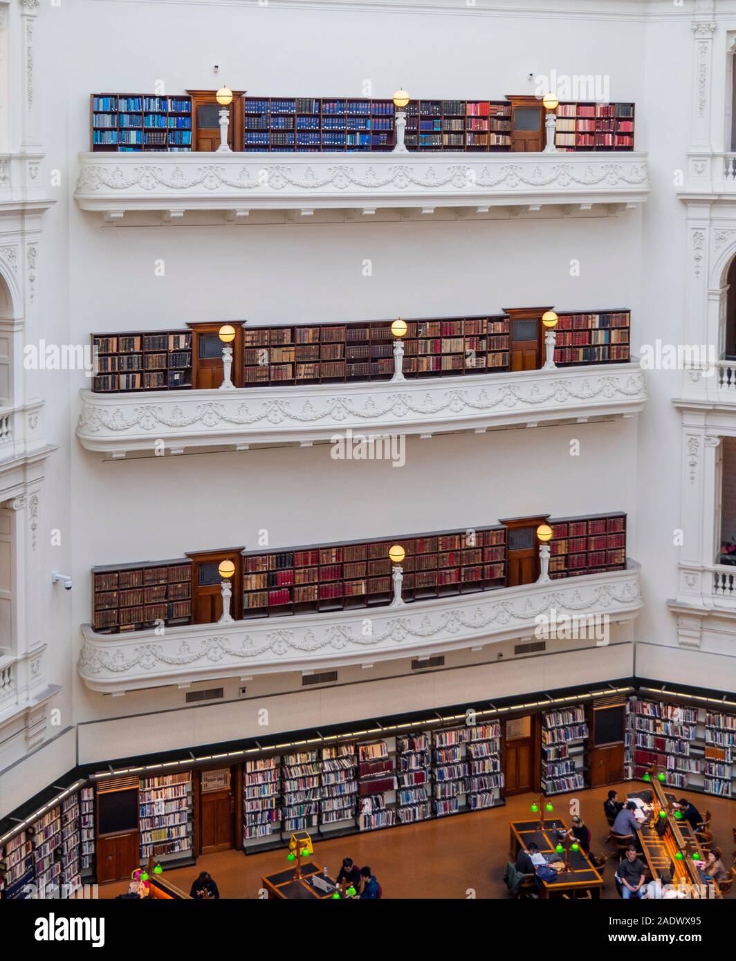 Volumes of books in bookcases in the LaTrobe Reading Room of State