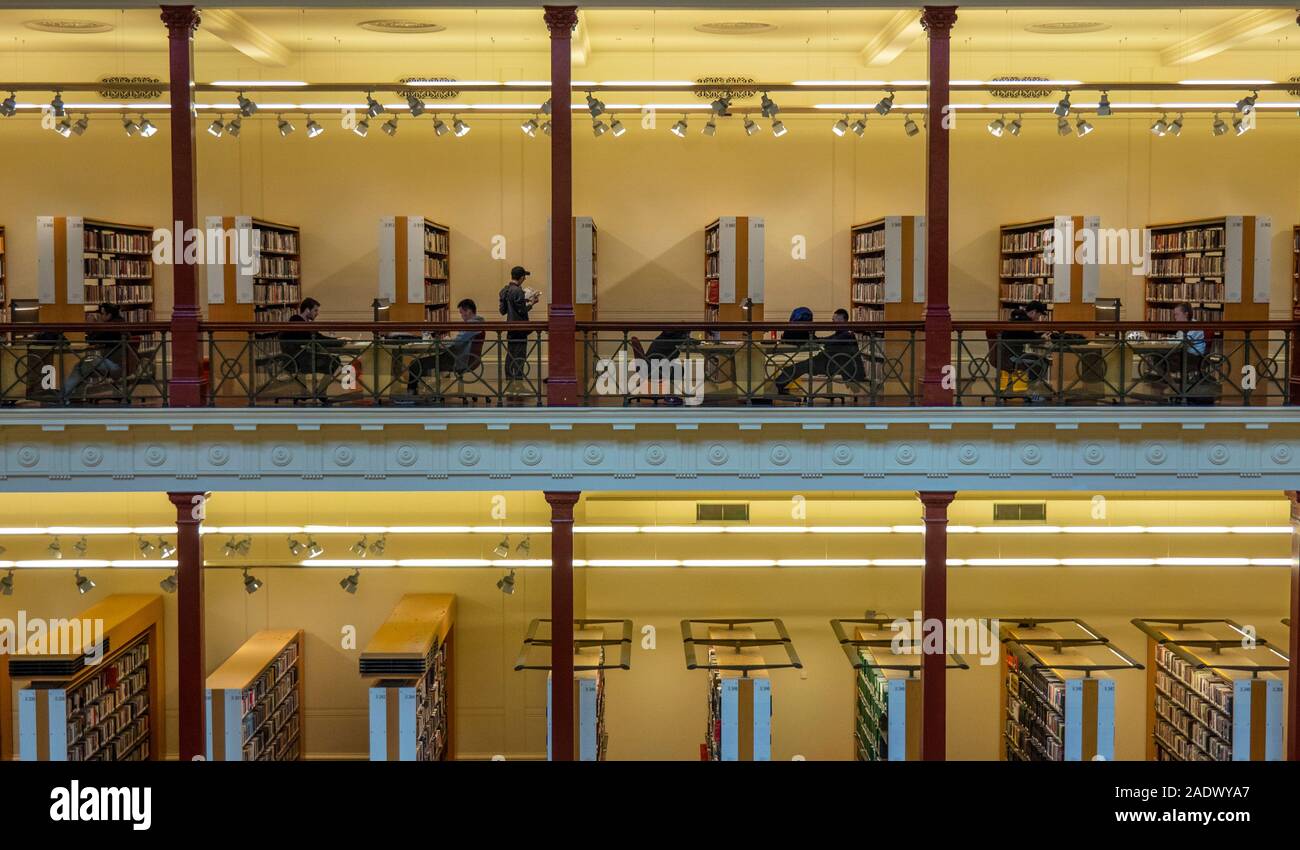 Students studying in Redmond Barry Reading Room in State Library