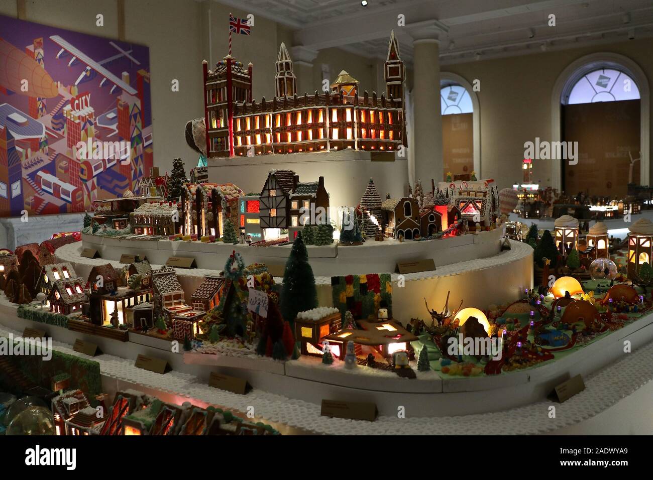 The Museum of Architecture's Gingerbread City 2019 . !00 architects create a city of gingerbread in London . Opening to the public on Saturday 7 December at London's iconic Somerset House , the City is constructed entirely from gingerbread and confectionery and includes high - rise buildings , office blocks and apartments , a university , stadium ,tram station,urban farm ,park and ferry terminal , five bridges , cycle ways and pedestrian paths .Based on a masterplan developed by Tinnalds and Urban design , the Gingerbread City champions sustainable design ideas and innovation on a mini scale . Stock Photo