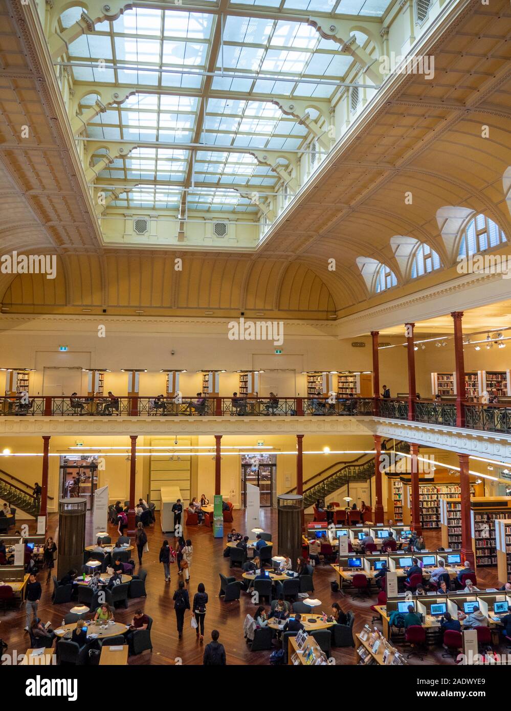 Students studying in Redmond Barry Reading Room in State Library Victoria Melbourne Australia