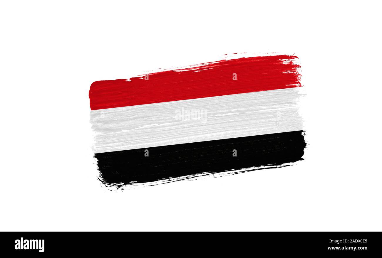 brush painted flag of Yemen isolated on white background Stock Photo ...