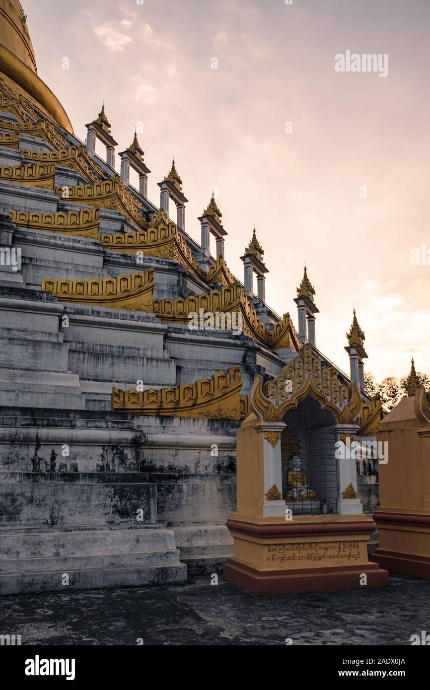 Bago, Myanmar - February 05, 2018: Mahazedi Pagoda at sunset - this is one of the most prominent Buddhist temples in Bago. Stock Photo