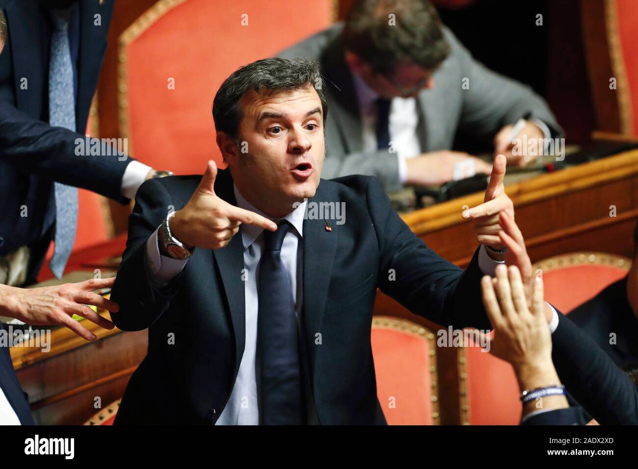 Italy, Rome, December 2, 2019 : The senator of Lega Movement Gian Marco Centinaio, argues during Senate session, making outrageous gestures.   Photo R Stock Photo